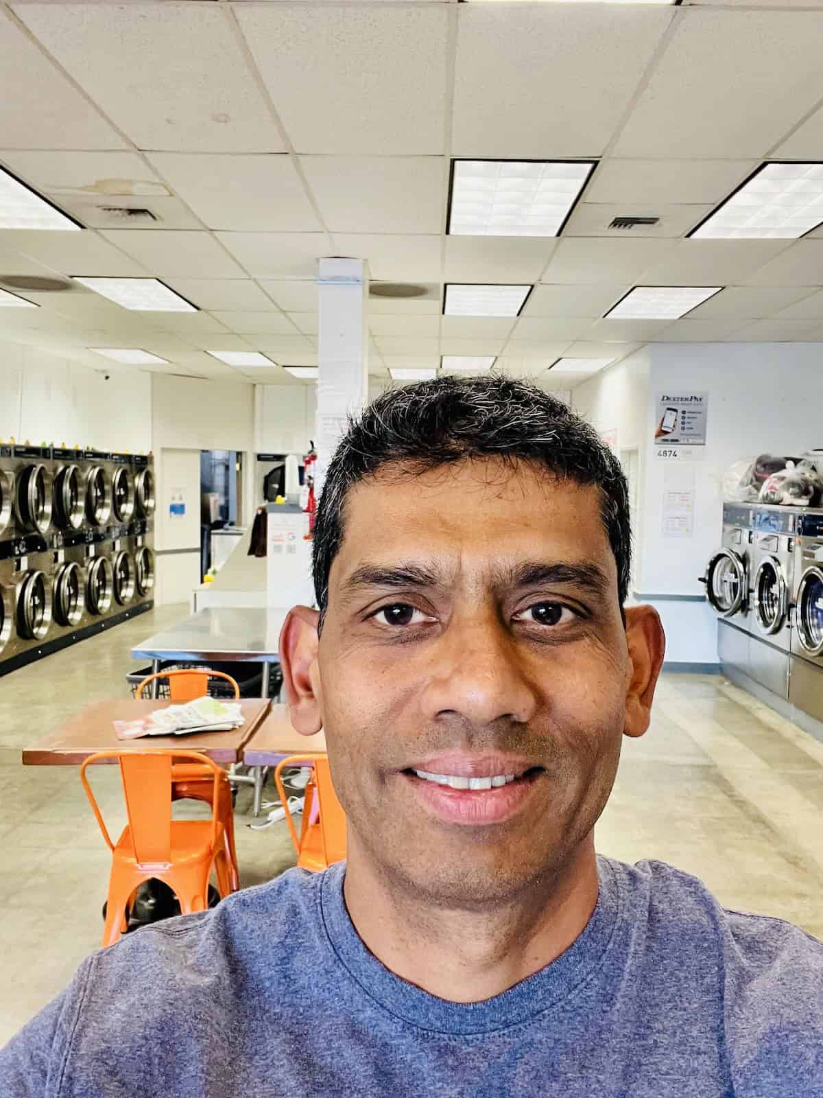 Laundromat owner inside the store